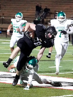 Alva's Lane Scarbrough (#88) is knocked out of bounds by dair's Garrett Long (#22). Lane grabbed two passes for a total of 49 yards. The Alva team had 512 yards total offense. Photo by Lynn L. Martin